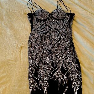 Evening dress with sparkles and spaghetti strips.